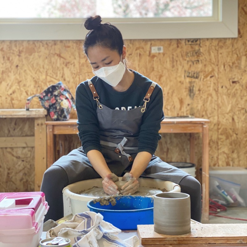Minwoo doing pottery